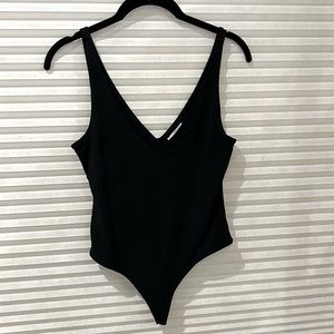 Small, deep V-neck, thing bodysuit by Leith